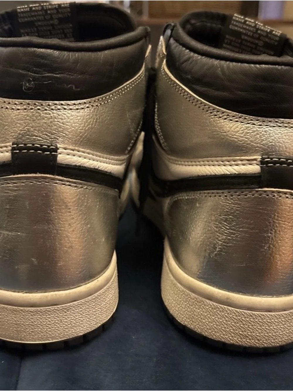 Nike Black and Gold High-Top Women’s Sneakers